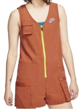 Nike Medium Woman’s Icon Clash Romper Desert Orange/Lemon Venom
